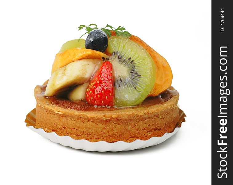 Tasty fruits tart over white background