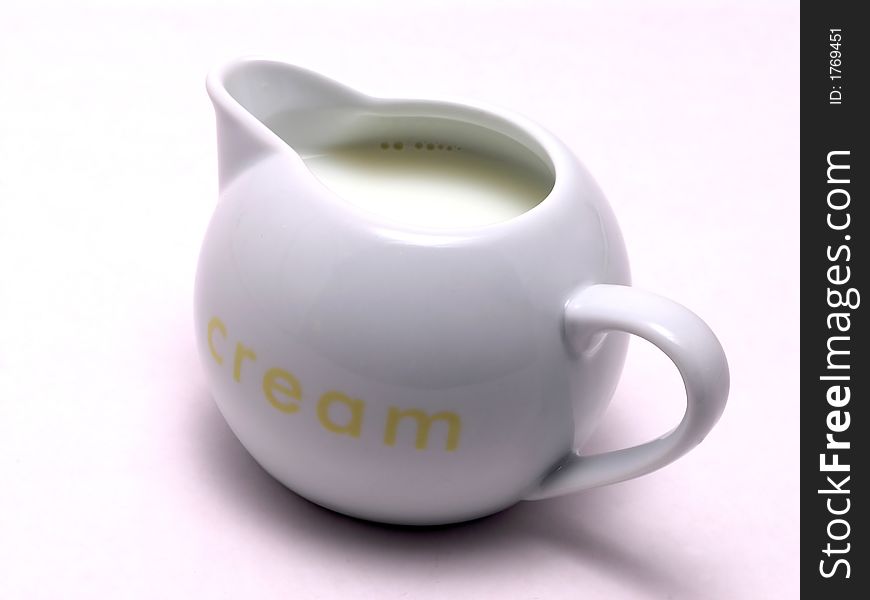 White Cream bowl with cream on white. White Cream bowl with cream on white