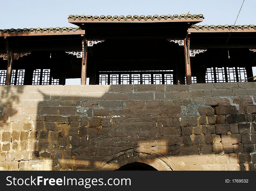 An antient style pavilion above old style bridge