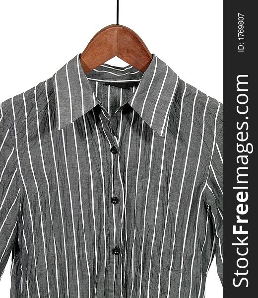 Gray striped shirt on wooden hanger, isolated on white.