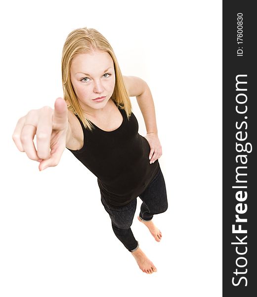 Young woman pointing isolated on white background