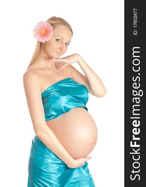 Pregnant woman holding her belly and flower. Pregnant woman holding her belly and flower