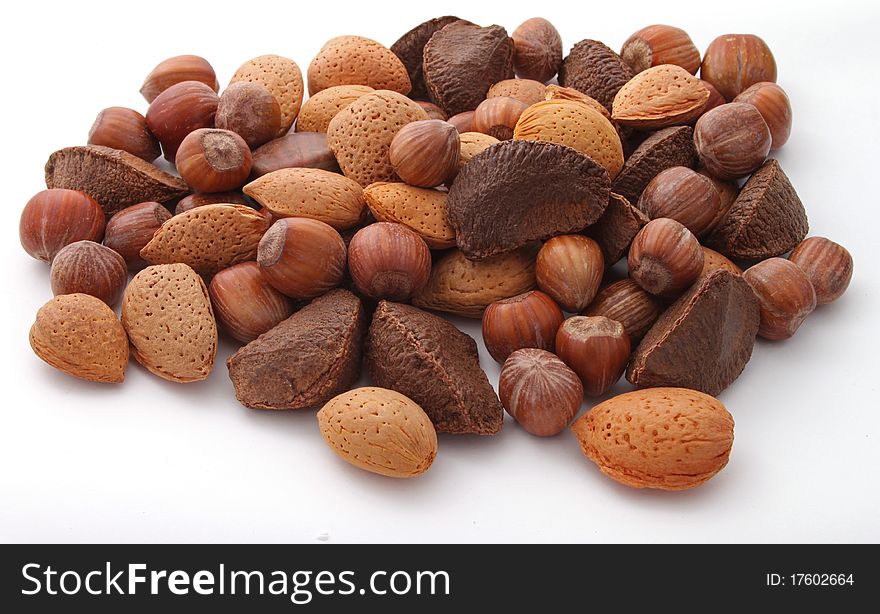 Mixed nuts on a plain white background.