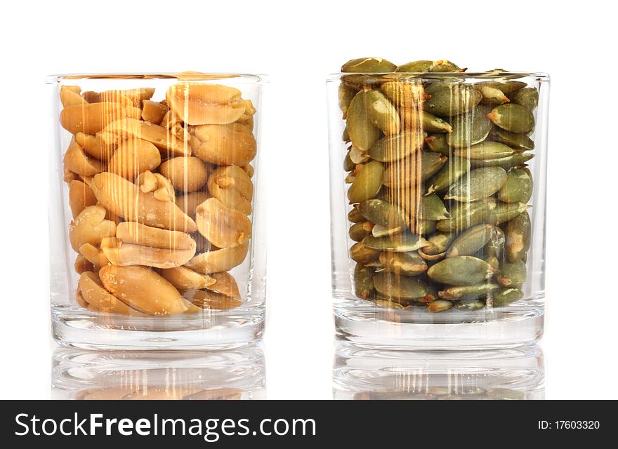Peanuts and Sunflower seeds in small glass
