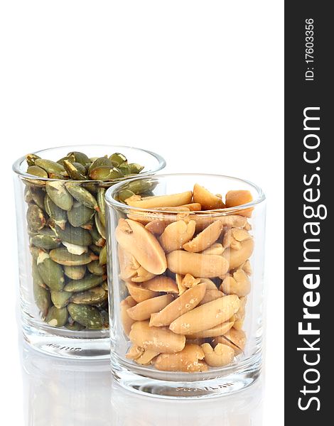 Peanuts and Sunflower seeds in small glass