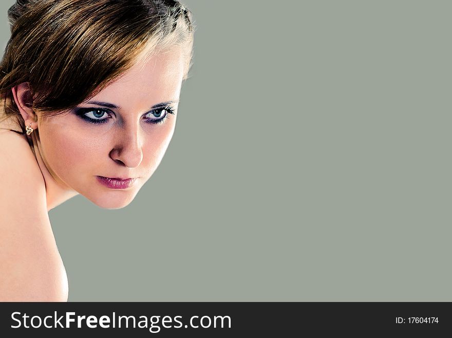 Beautiful woman face. On green background. Beautiful woman face. On green background