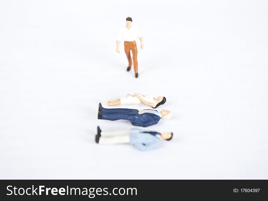 Miniature people on white background. Miniature people on white background