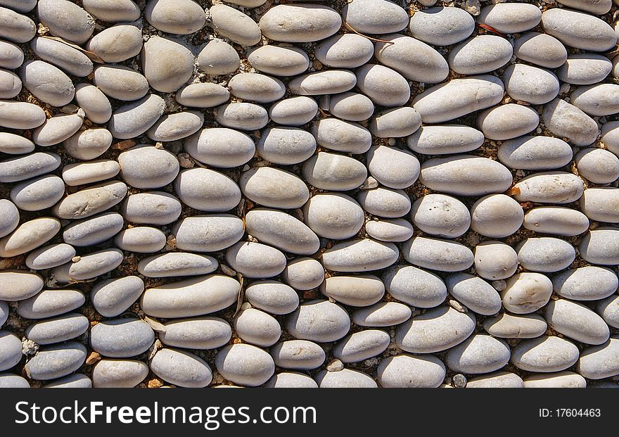 Pavement made of grey pebbles. Pavement made of grey pebbles