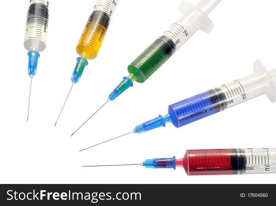 Five disposable syringe against white background