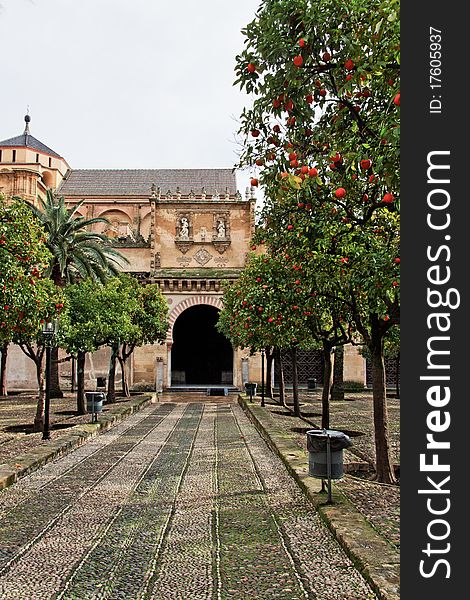 The Cathedral Mosque Entrance as seen from Los Naranjos Patio in Cordoba, Spain. The Cathedral Mosque Entrance as seen from Los Naranjos Patio in Cordoba, Spain