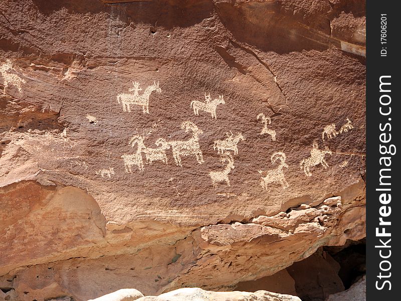 Horse and Ram Petroglyphs on red rock