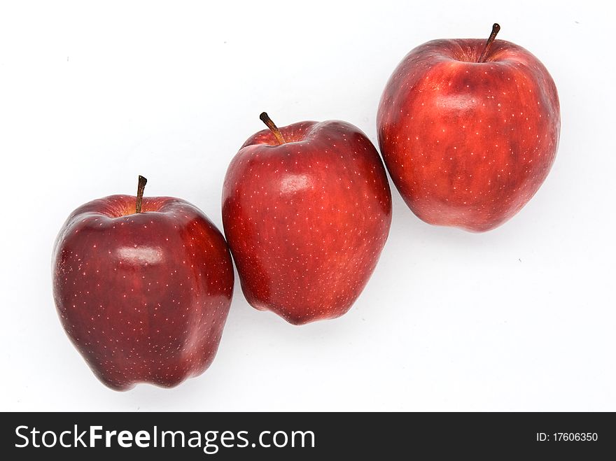 Fresh red apple isolated on white background.