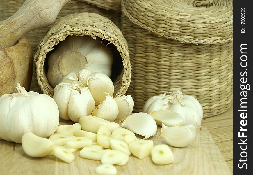 Garlic pods over wooden table