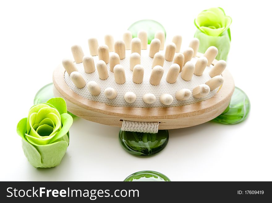 Massage brush and flower blossom with glass stone