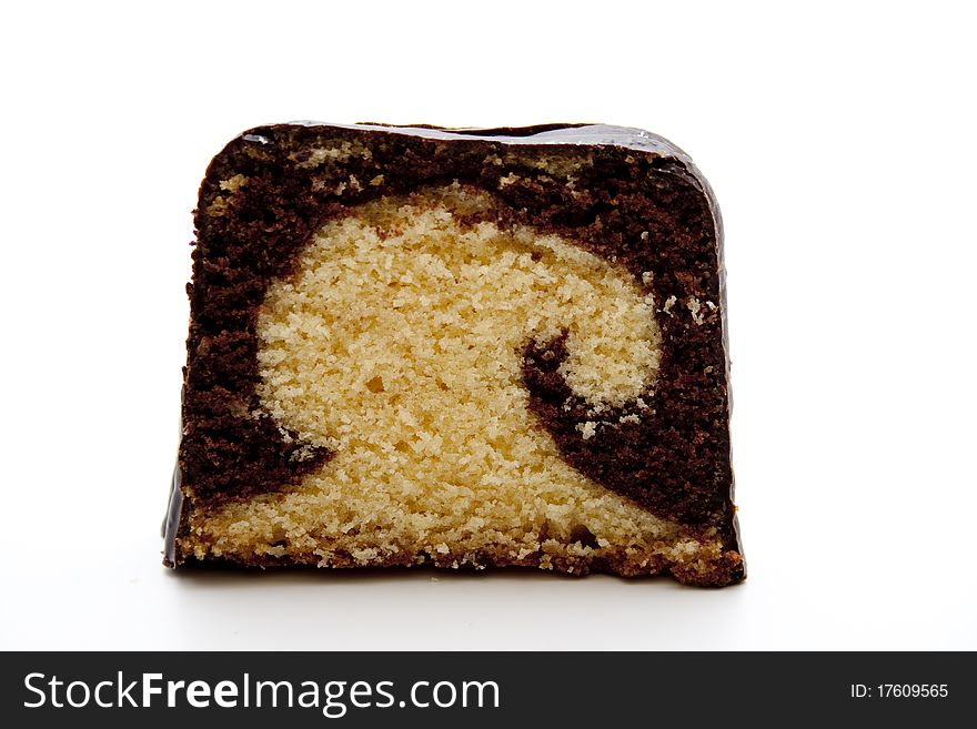 Marble cake with chocolate onto white background