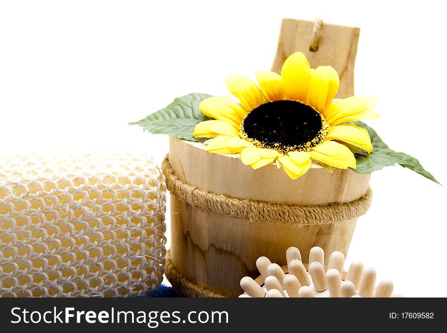 Sunflower in the wood receptacle with sponge
