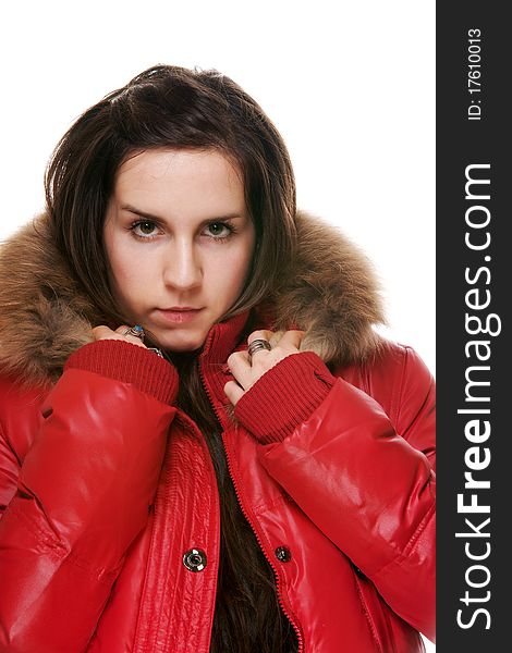 The girl in a red jacket on a white background
