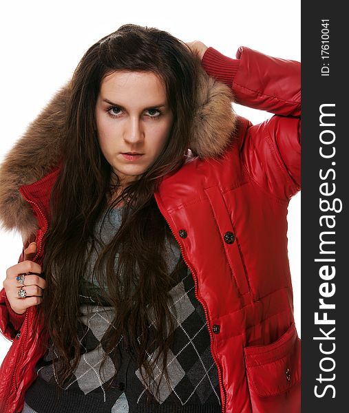 The girl in a red jacket on a white background