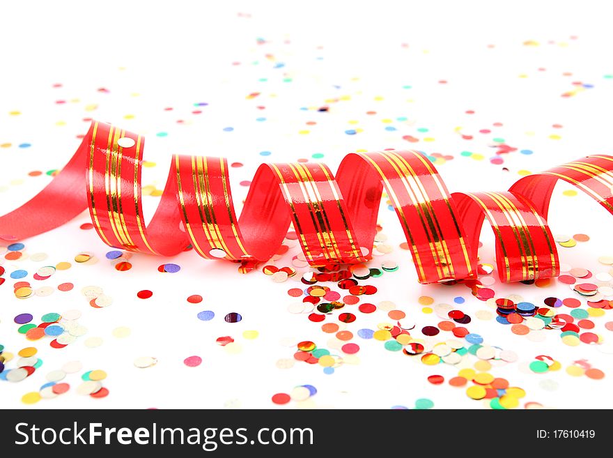 Confetti and streamer on a white background