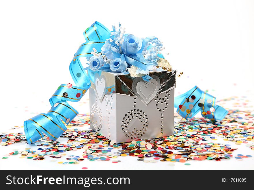 Gift and streamer on a white background