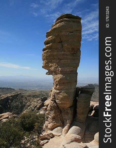 Rock formation standing over desert skyline. Rock formation standing over desert skyline