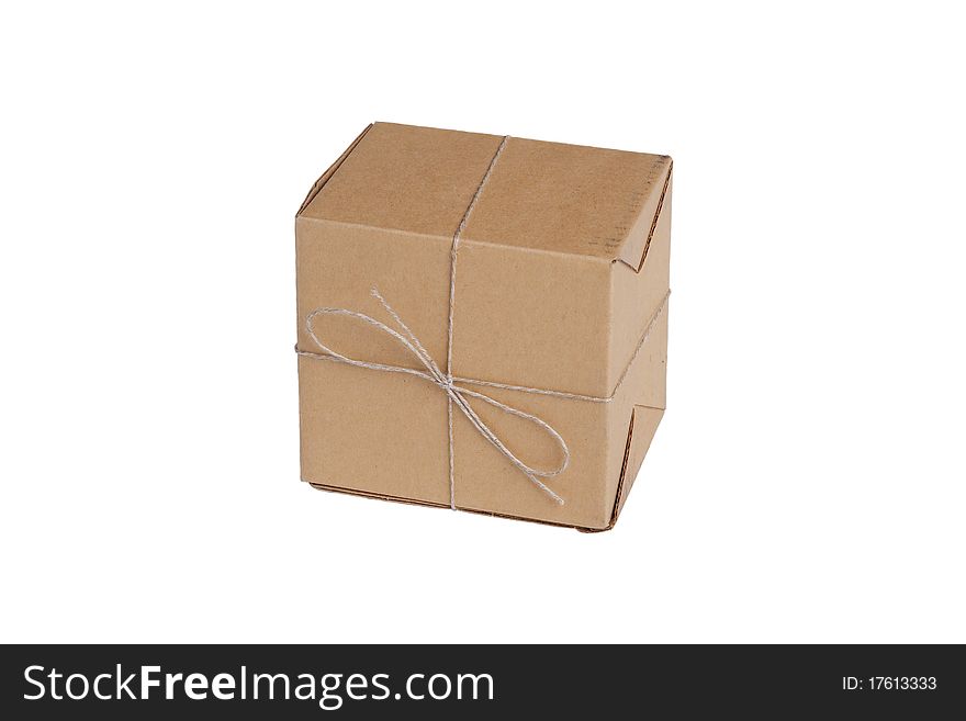 Packing box tied with a rope on a white background