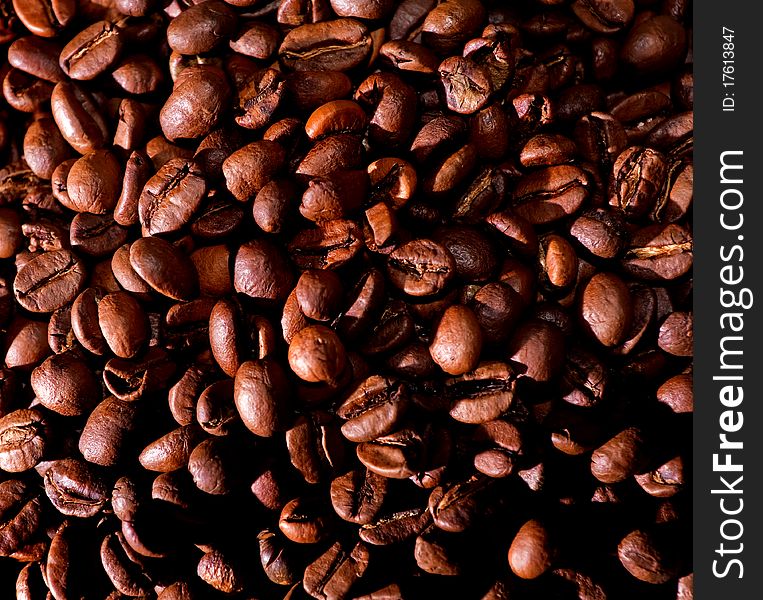 Coffee beans natural brown background