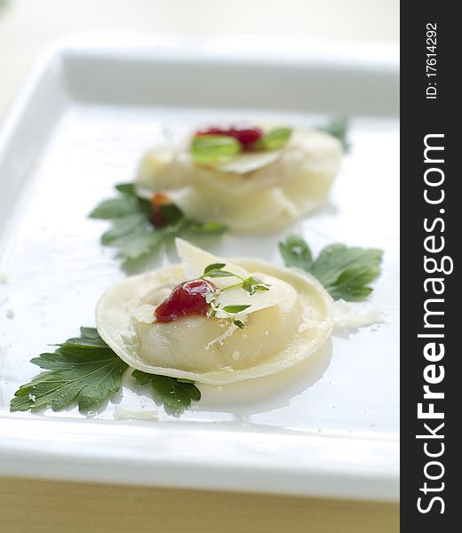 Ravioli with olive oil and cheese