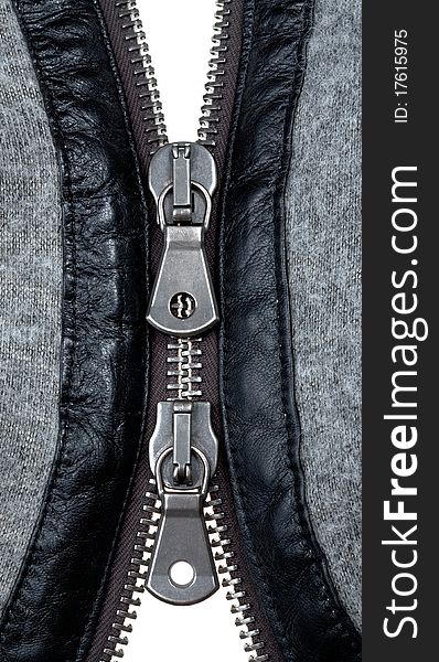 Metal double zipper lock in unzip wool jacket. close-up