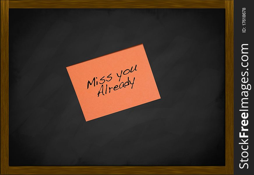 Miss you note on a framed blackboard