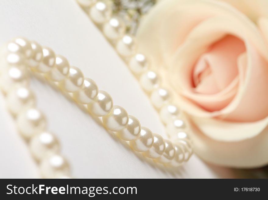 Pearl necklace with beautiful cream rose