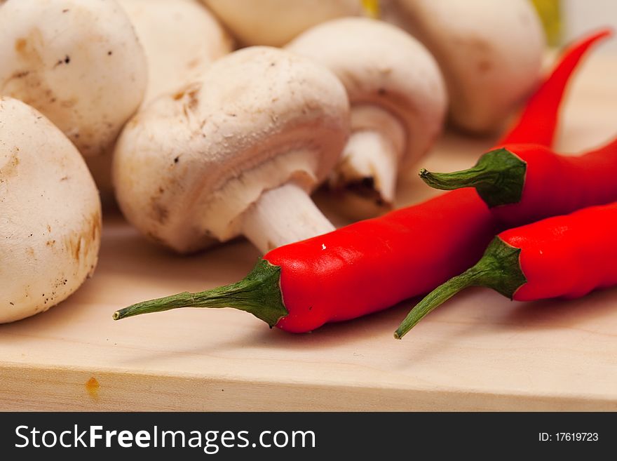 Red hot chili pepper and mushrooms
