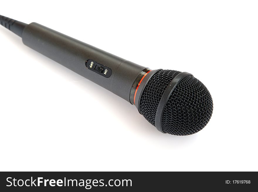 Black microphone isolated on white background.