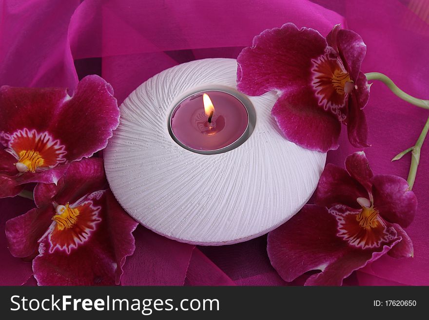 Decoration with orchid and candle