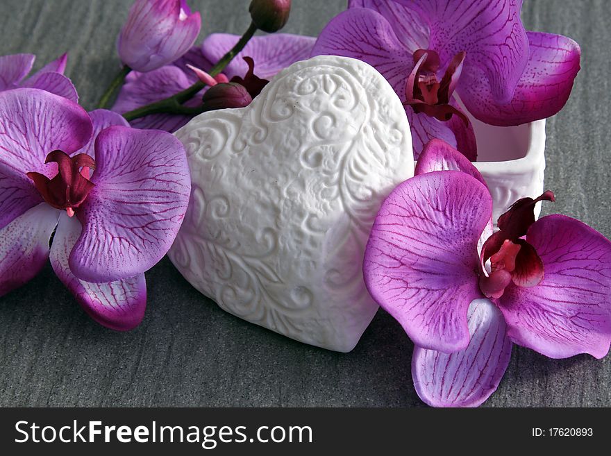 Heart box with orchids bloom