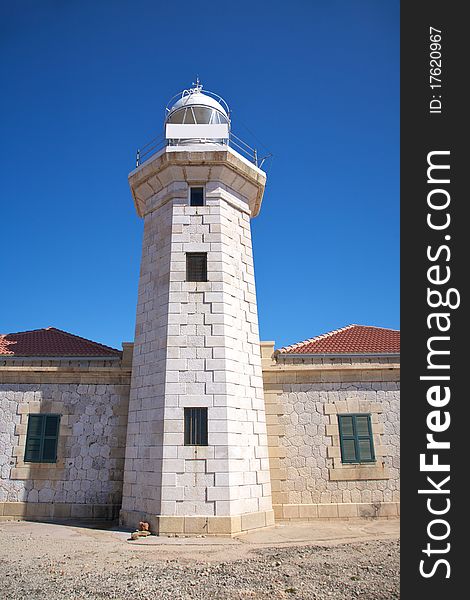 Lighthouse of Punta Nati at Menorca island in Spain. Lighthouse of Punta Nati at Menorca island in Spain