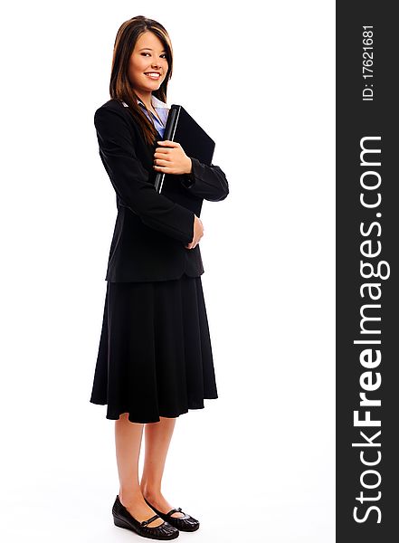 Full length portrait of a confident attractive businesswoman holding a laptop. Full length portrait of a confident attractive businesswoman holding a laptop