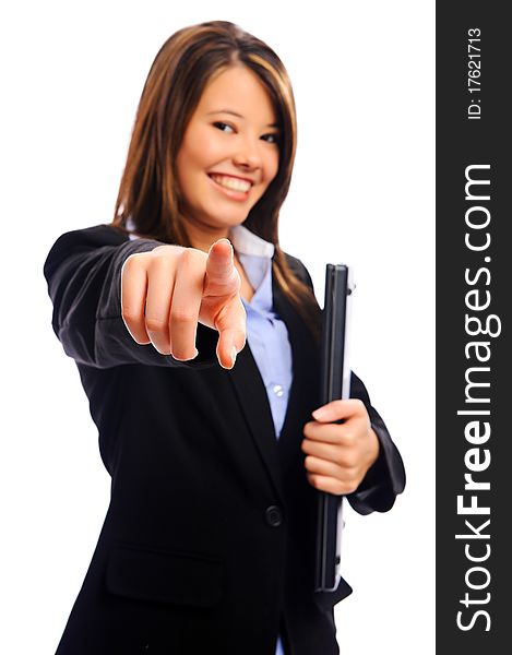Successful businesswoman pointing into the camera, selective focus on finger. Successful businesswoman pointing into the camera, selective focus on finger