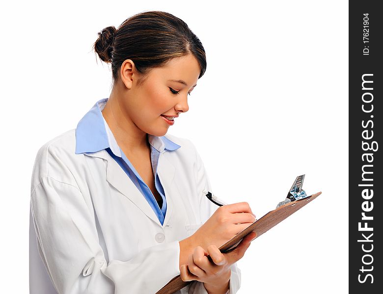 Young doctor writes on a clipboard, isolated on white. Young doctor writes on a clipboard, isolated on white
