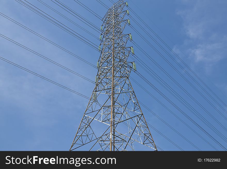 High-voltage transmission towers in the sky bright. High-voltage transmission towers in the sky bright.
