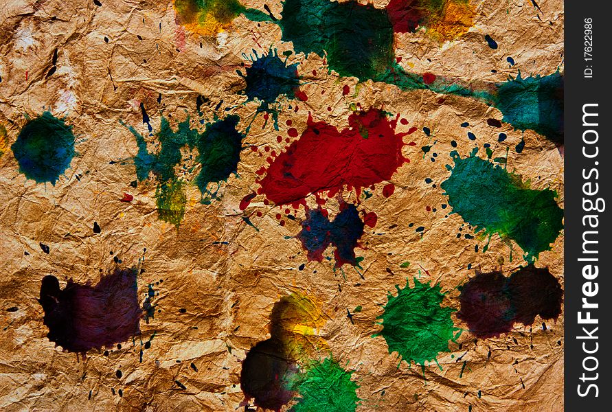 Abstract multicolor splash on Wrinkled old brown paper texture. Abstract multicolor splash on Wrinkled old brown paper texture
