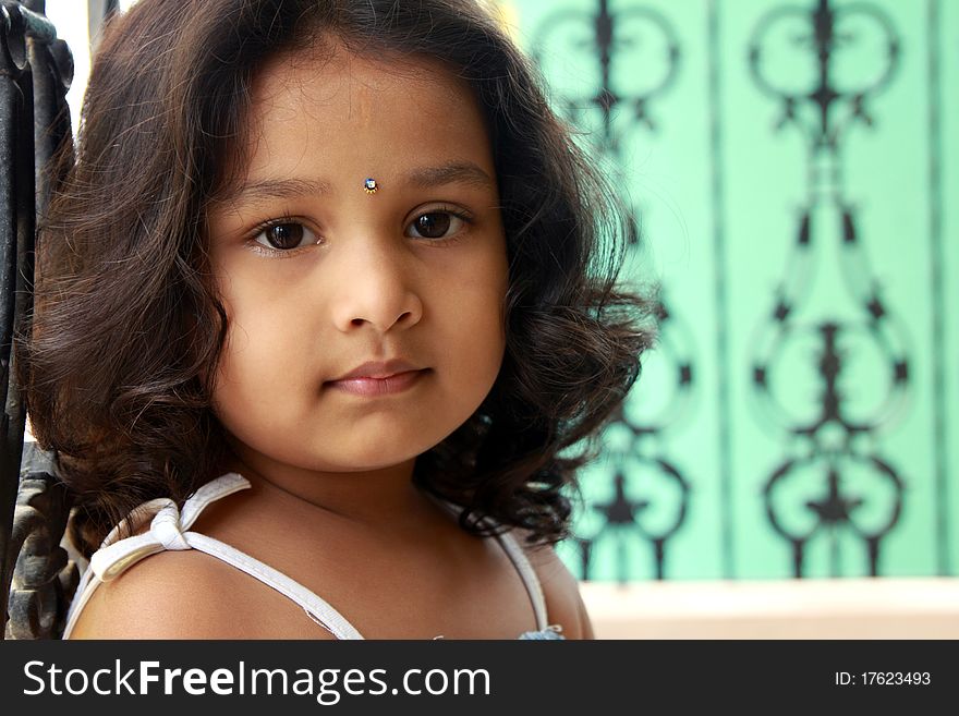 Portrait Of  Indian Girl Posing to the Camera. Portrait Of  Indian Girl Posing to the Camera