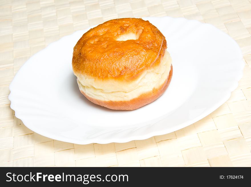 One appetizing doughnut on plate