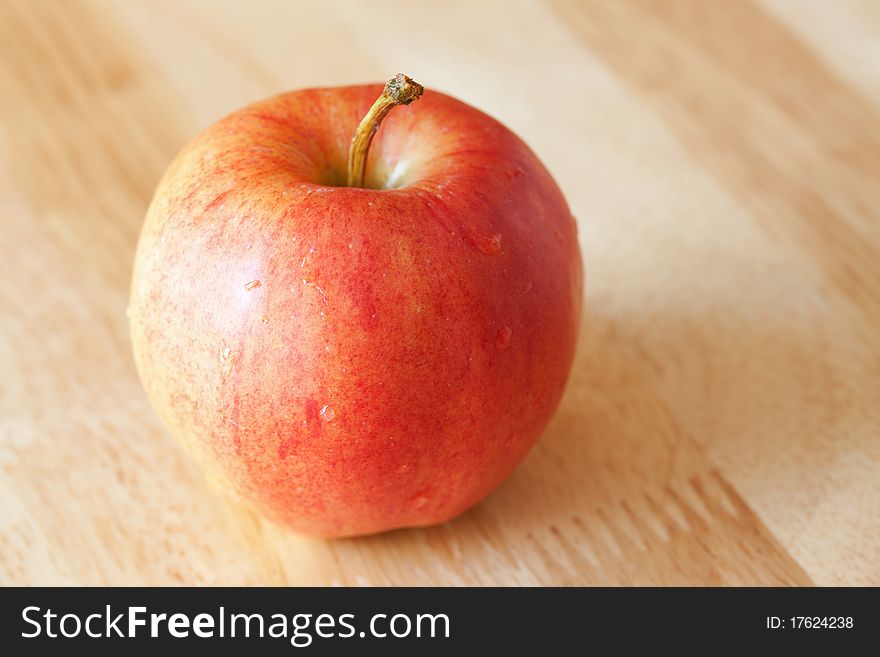 Apple on rustic wood background