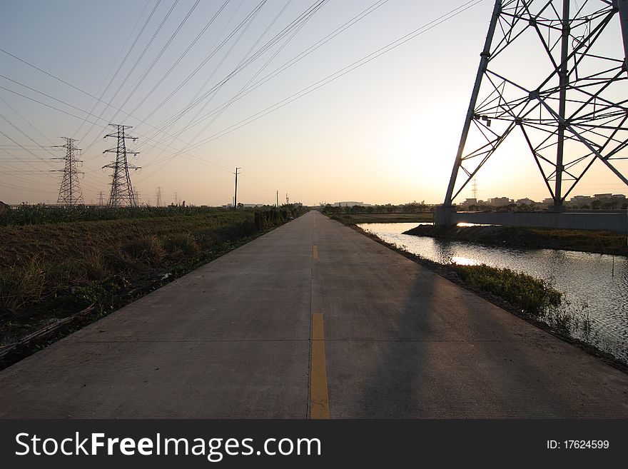 High-voltage tower with highway