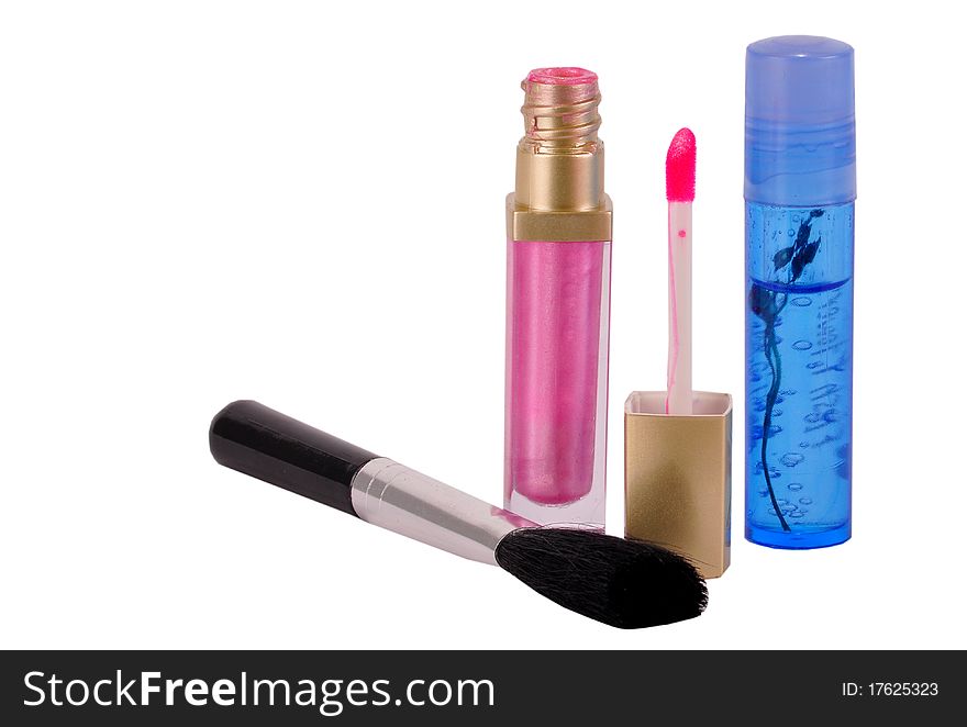 Makeup brush and lipgloss isolated on white. Makeup brush and lipgloss isolated on white