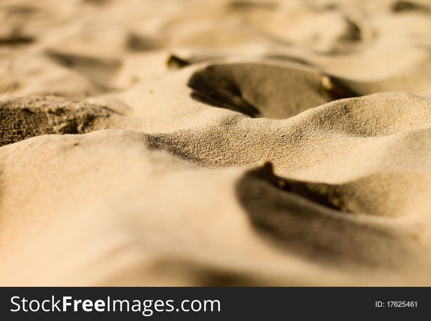 Golden sand on beach closeup