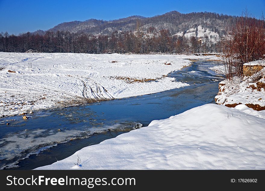 Transversing river in winter day