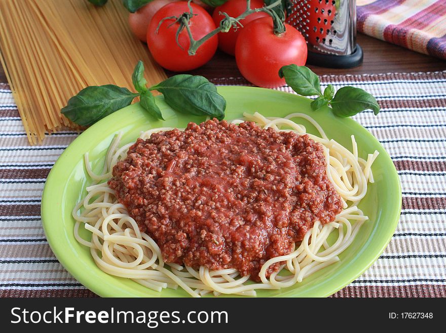 Plate with spaghetti and tomato sauce. Plate with spaghetti and tomato sauce