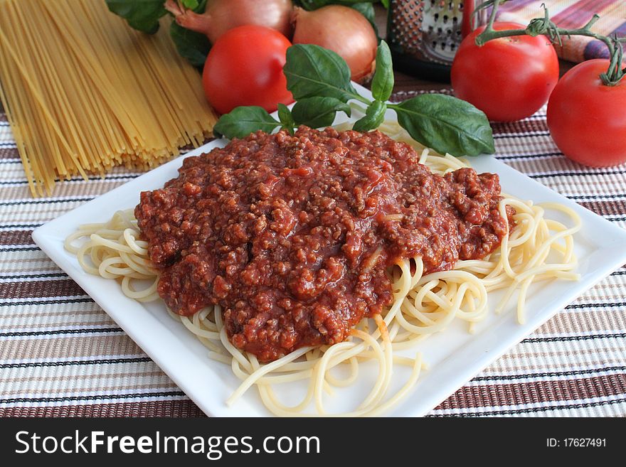 Plate with spaghetti and tomato sauce. Plate with spaghetti and tomato sauce